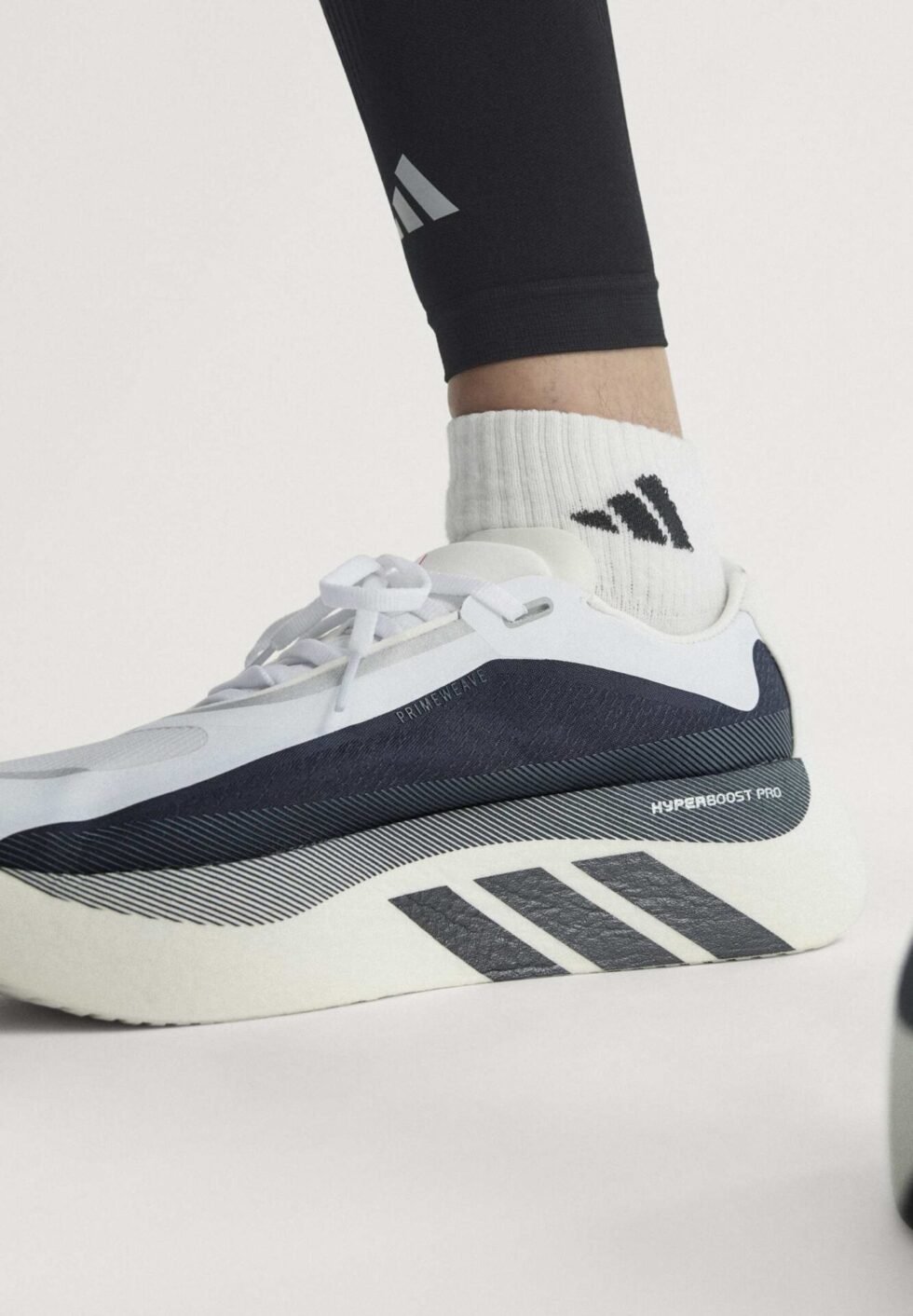 adidas Performance HYPERBOOST EDGE - Road running shoes - footwear white/aurora onix/solar turbo